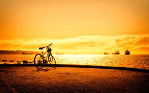 Bicycle-Parked-At-Sunset-Hd-Image